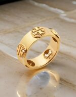 Splurge Accesorio, Gold Plated Tory Ring, Splurge Accesorio Gold Plated Tory Ring, Jewelry, Gold Plated Ring, Tory Burch, Fashion Accessories, Women's Jewelry, Splurge Accesorio, Accessory, Elegant Jewelry, Stylish Ring, Modern Jewelry, Trendy Jewelry, Luxury Jewelry, Jewelry Collection